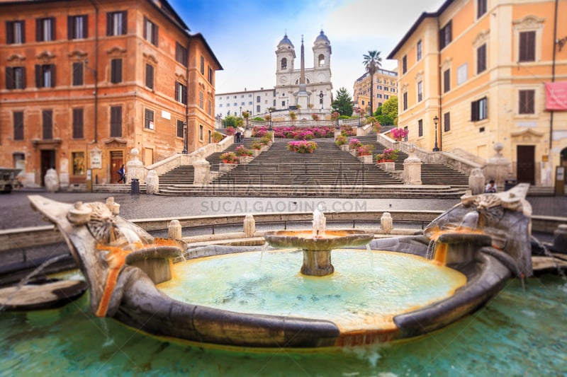 Spanish Steps in the morning with azaleas in Rome, Italy. Rome Spanish Steps (Scalinata della Trinità dei Monti) are a famous landmark and attraction of Rome and Italy.