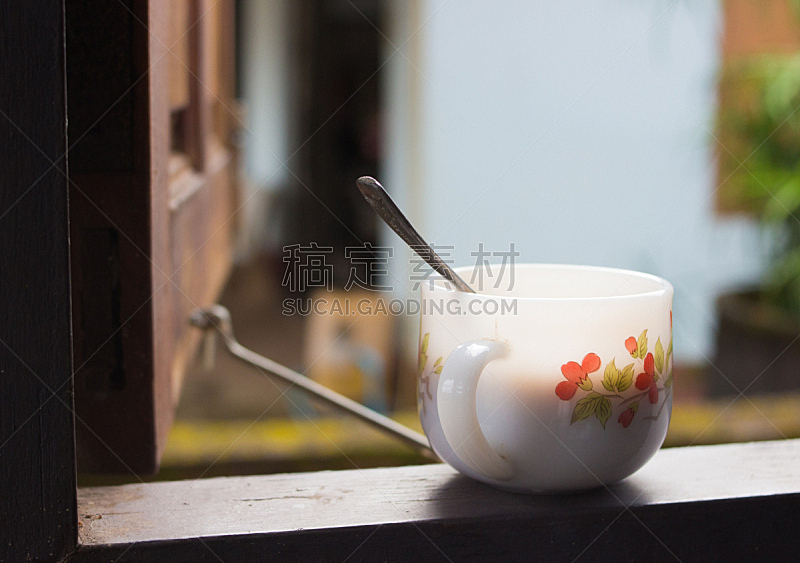 Morning light with coffee on window