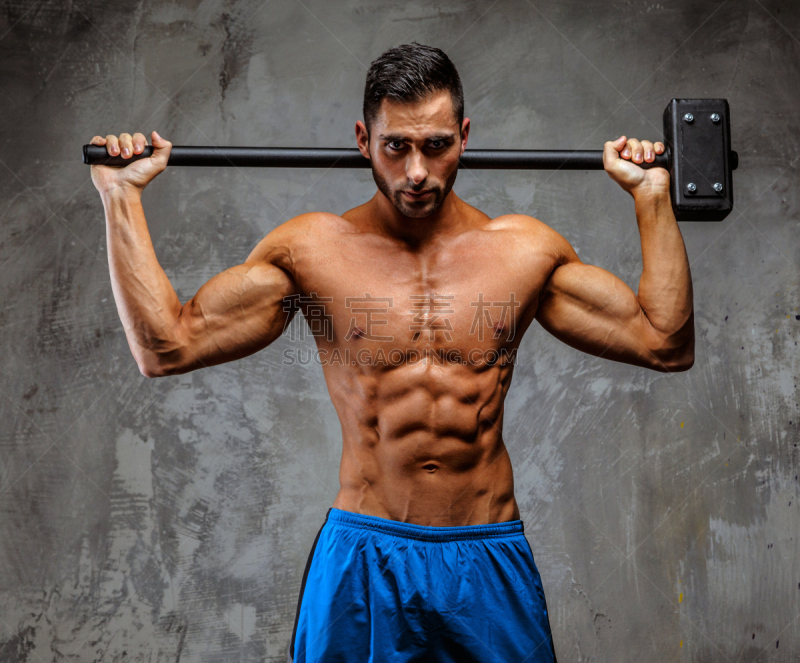 Muscular guy in blue shorts