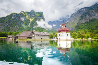 Lake KÃ¶nigssee with St. BartholomÃ¤ pilgrimage chapel in summer, Bavaria, Germany