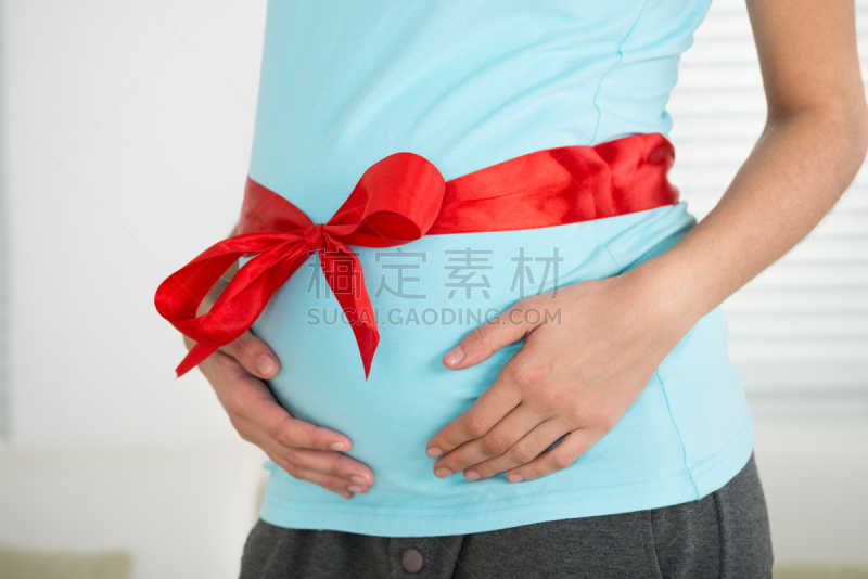 女人,艾滋病警示丝带,胃,绑扎了的,仅一个女人,水平画幅,蝴蝶结,手,腹腔