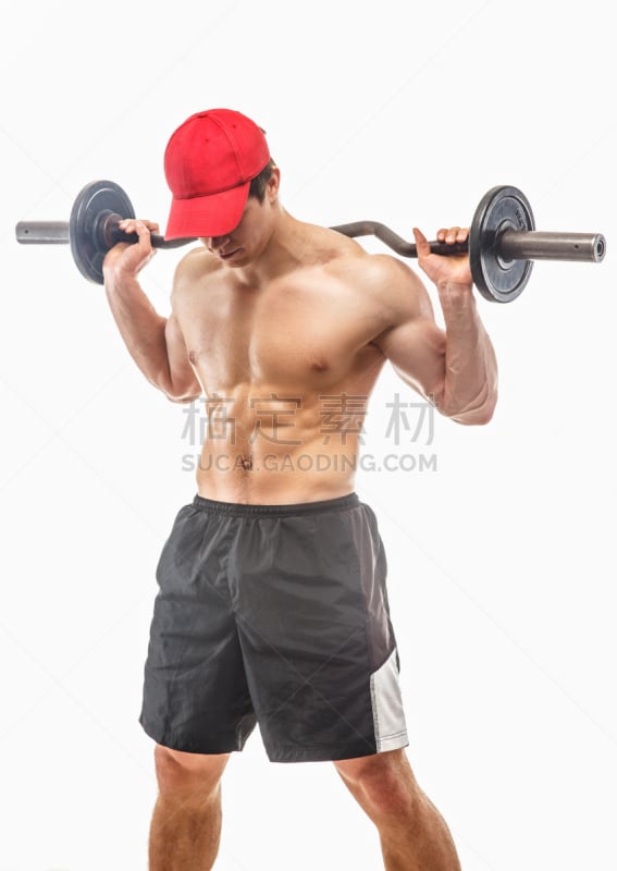 Muscular guy holding barbell