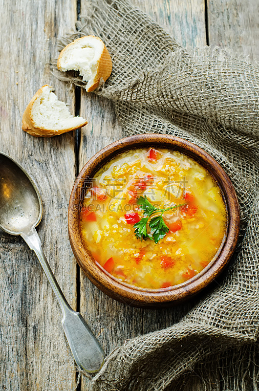 soup with salmon, potatoes and millet