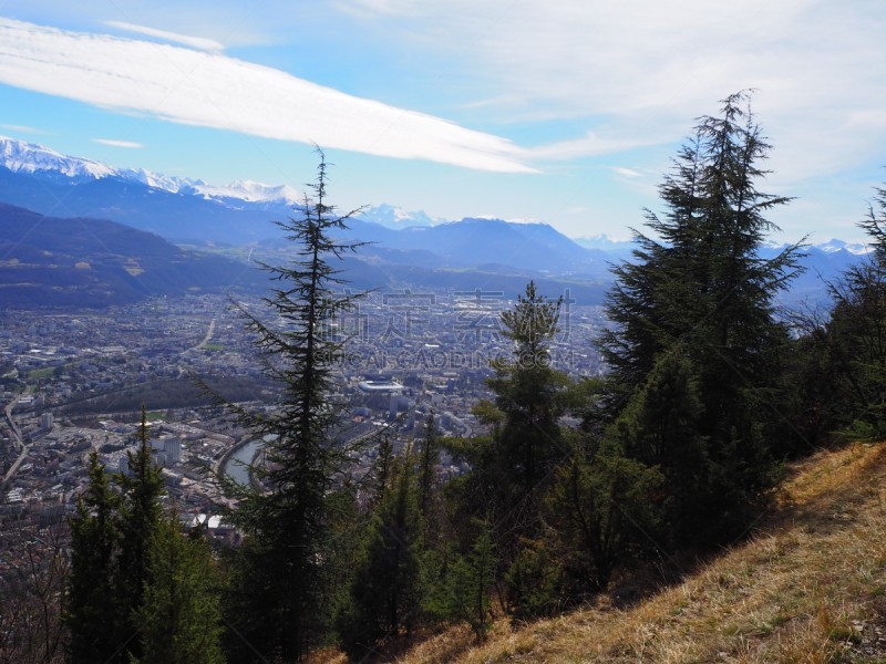 Grenoble, France – March 12, 2019: photography showing the Alps mountain and the villages surrounding the city of Grenoble, France. The photography was taken in the city of Grenoble, France.