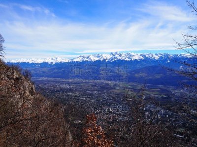 Grenoble, France – March 12, 2019: photography showing the Alps mountain and the villages surrounding the city of Grenoble, France. The photography was taken in the city of Grenoble, France.