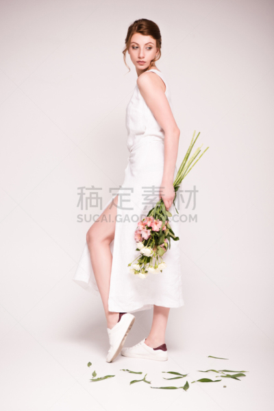 girl in white dress with flowers