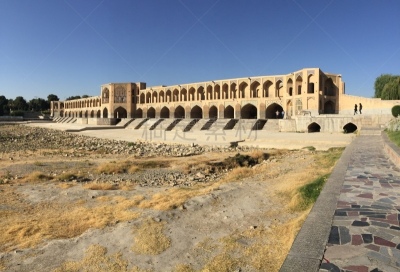 Si-o-se Pol Bridge is a stone double-deck arch bridge in Isfahan, Iran. It is also called Siose Bridge (which in Persian means “33 Bridge” or “Bridge of 33 Arches”)