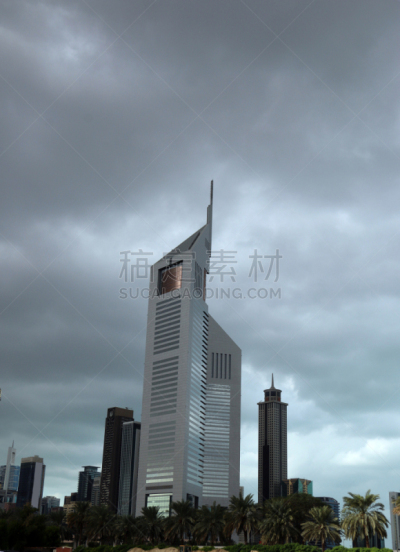 Amazing view of Emirates Towers, Twins Skyscrapers. A view from Sheikh Zayed Road, Residential and Business Skyline, Dubai, UAE