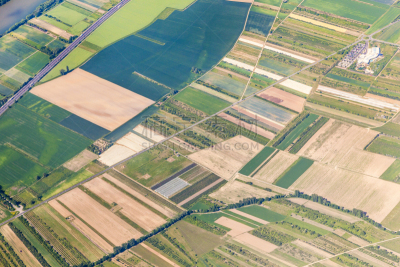 aerial of small village with fields