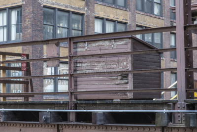 Wooden box sitting on elevated platform