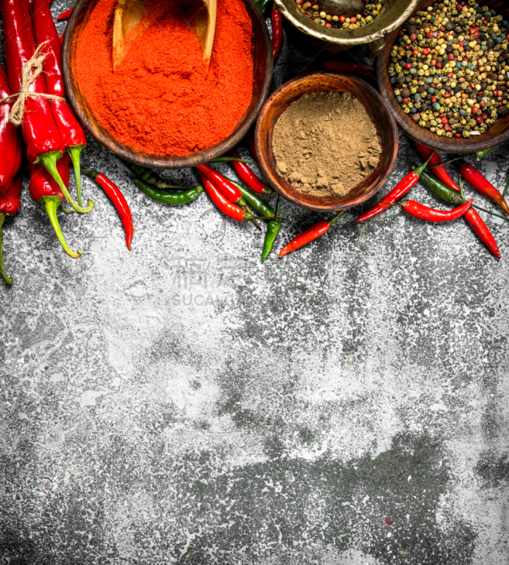 Ground red hot chili peppers in a bowl.