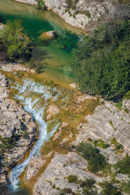 Cava Grande del Cassibile Natural Reserve, Siracusa, Sicily, Italy. It has one of Europeâs biggest canyon, dug by the river Cassabile through majestic mountains and filling emerald water lakes and waterfalls.