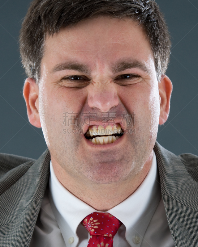 男商人,狂怒的,人的牙齿,轻蔑的,垂直画幅,残酷的,仅男人,仅成年人,人的脸部,成年的