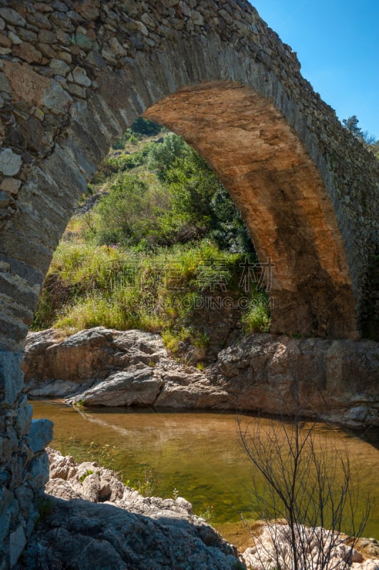 Historic arch bridge Le Pont des Fees in Grimaud-Village in the Department Var of the province Provence-Alpes-Cote d´Azur