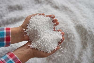 urea fertilizer in woman hand.