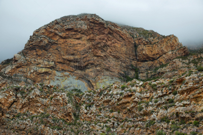 Majestic rocky redish mountains in Seweweekspoort pass