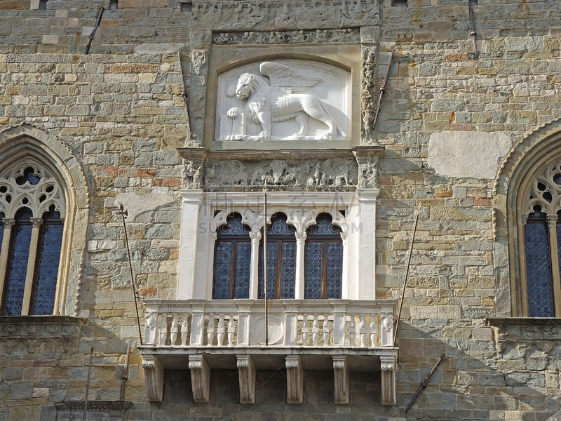 Bergamo - Old city (Città Alta). Landscape on the Lion of Saint Marco symbol of the presence of Venice on the ancient Administration Headquarter called Palazzo della Ragione