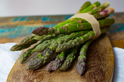 Green young asparagus shoots â premium healtry food, ready to cook and for grill