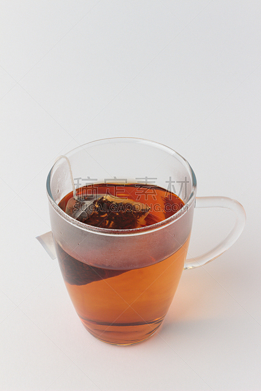 玻璃杯,茶,茶包,红茶,垂直画幅,橙色,无人,热饮,玻璃,影棚拍摄