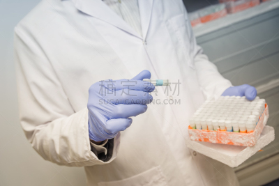Scientist Holding Frozen Algae Specimens