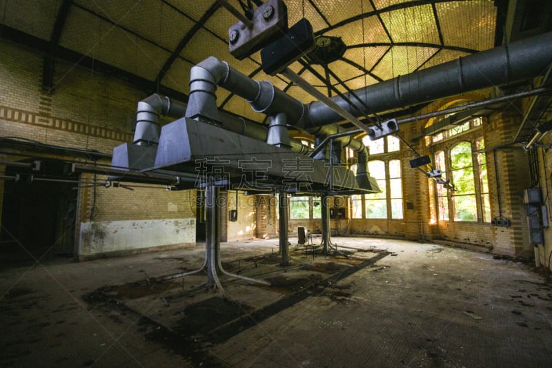 pipes machinery and turbine at an abandoned place at beelitz heilstätten