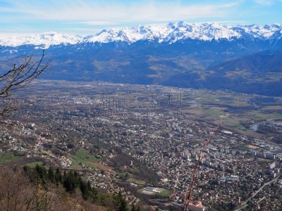 Grenoble, France – March 12, 2019: photography showing the Alps mountain and the villages surrounding the city of Grenoble, France. The photography was taken in the city of Grenoble, France.