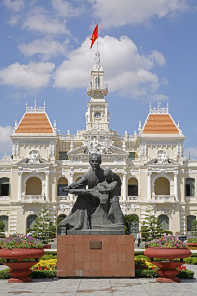 Ho Chi Minh with child and People’s Committee Building