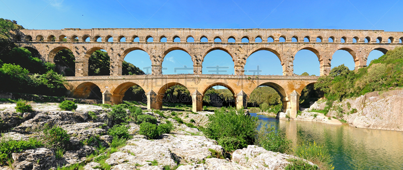 The Pont du Gard is a Roman aqueduct with three levels located in Vers-Pont-du-Gard between Uzès and Remoulins, not far from Nîmes, in the Gard department.