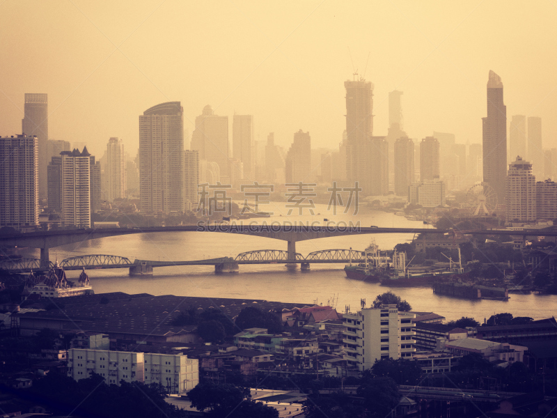 Bangkok river side cityscape. Bangkok night view in the business district. at twilight.Panorama view of Bangkok city scape at night time. vintage colour tone