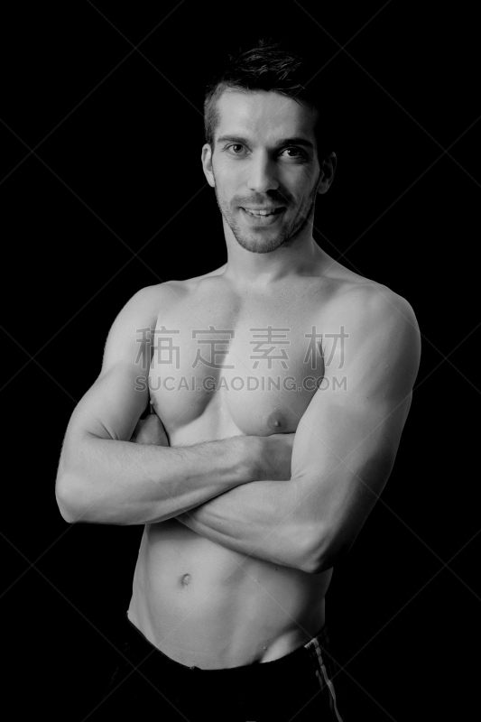 Shirtless man smiling