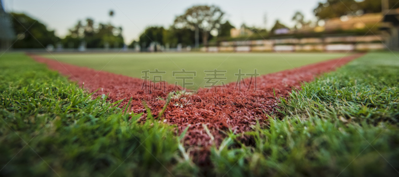 Green bowls lawn close up during the day.