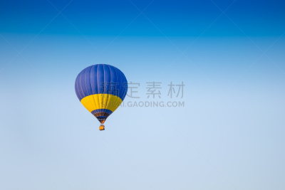 Colorful of hot air balloon with fire and blue sky background