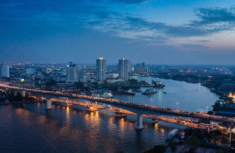 Bangkok river side cityscape. Bangkok night view in the business district. at twilight.Panorama view of Bangkok city scape at night time. vintage colour tone