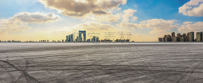 Empty asphalt road and beautiful city skyline in Suzhou