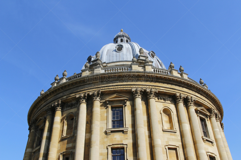 Top Part of the Radcliffe Camera with clear blue sky in sunny day, part of the Oxford University