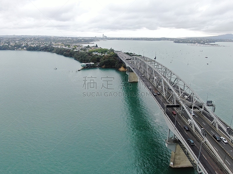 The Amazing Auckland Harbour Bridge, the marina bay, beaches, and the general cityscape of Auckland New Zealand