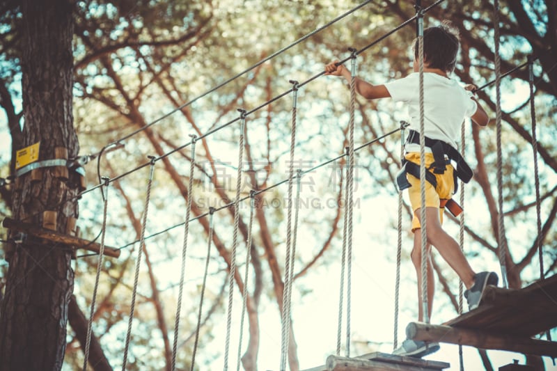 Little boy in adventure park