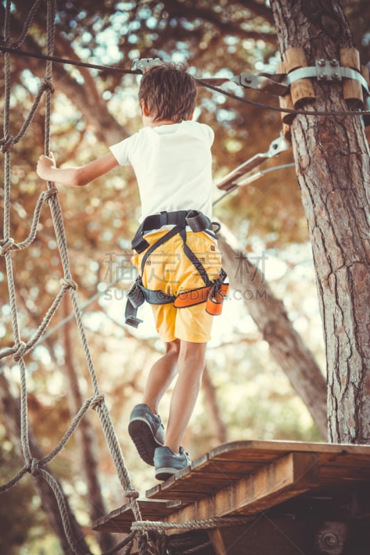 Little boy in adventure park