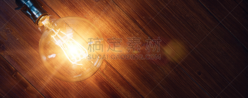 电灯泡,特写,暗色,一个物体,照明设备,灵感,一个人,技术,橙色,复古风格