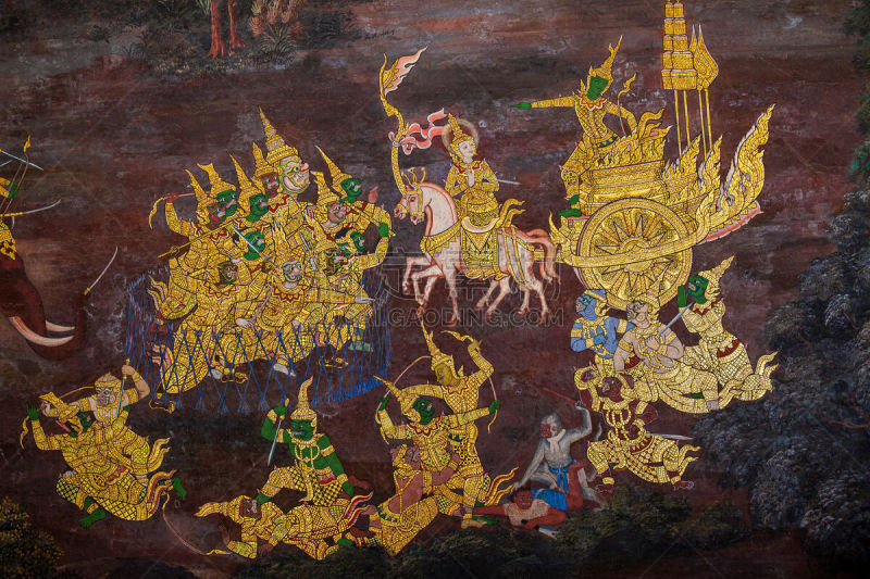 Gold color of old mural is the story of Ramakian ,Ancient fresco at Wat Phra Kaew temple in Bangkok, Thailand