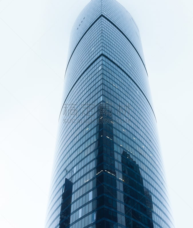 Glass facades of modern skyscrapers at business district