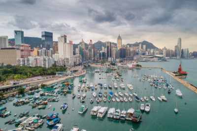 Aerial view panoramic of the Hong Kong City Skyline and Victoria Harbour at sunset at china