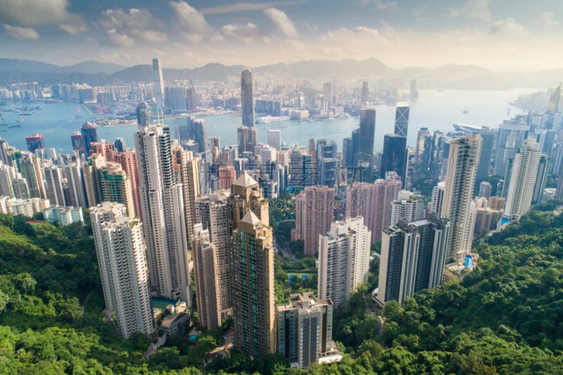 Aerial view panoramic of the Hong Kong City Skyline and Victoria Harbour at sunset at china