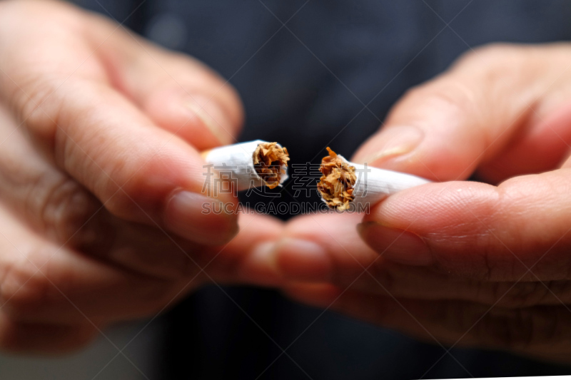 吸烟问题,香烟,手,碾碎了的,水平画幅,肺癌,户外,特写,部分
