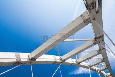 Cable-stayed bridge fragment under blue sky