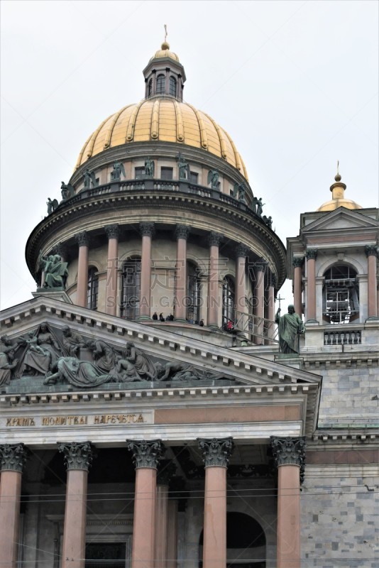 St. Petersburg, Russia, January 2020. Fragment of the facade and the golden dome of St. Isaac`s Orthodox Cathedral.