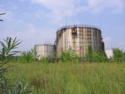 large rusty bunkers storage tanks for fuel and gasoline strategic aviation fuel stock