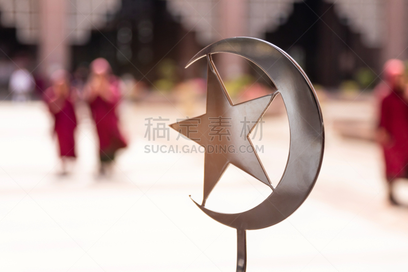 The star and crescent symbol at Putra Mosque is one of the most visited landmarks in Putrajaya, Malaysia.