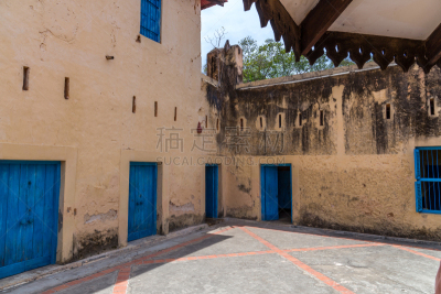 2018.02.24, Stone Town, Zanzibar, Tanzania. Travel around Africa. Façade of authentic building with blue door.