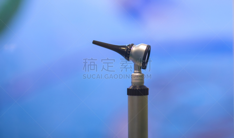 耳镜,人的耳朵,留白,蓝色背景,医疗器械